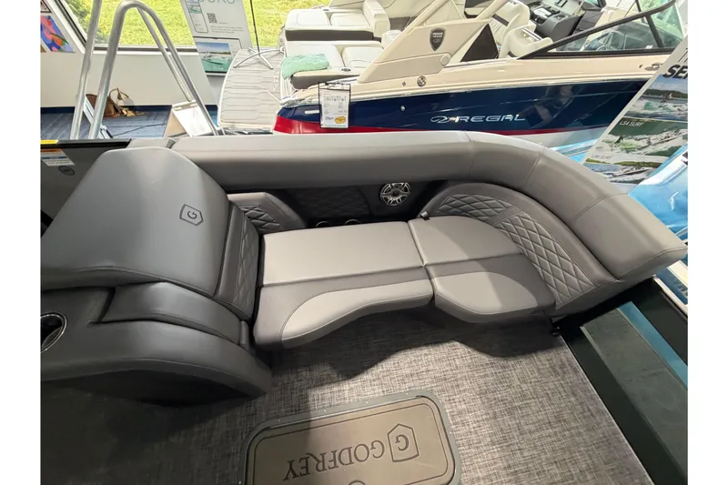 Slide: The Image of Luxurious seating on 2026 Godfrey Monaco 235ULC boat, featuring elegant gray upholstery. - 4
