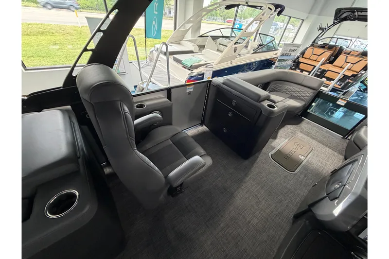 Slide: The Image of Luxurious interior of 2026 Godfrey Monaco 235ULC pontoon boat with plush seating and modern design. - 6