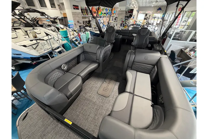 Slide: The Image of Luxurious interior of 2026 Godfrey Monaco 235ULC pontoon boat with plush seating. - 8
