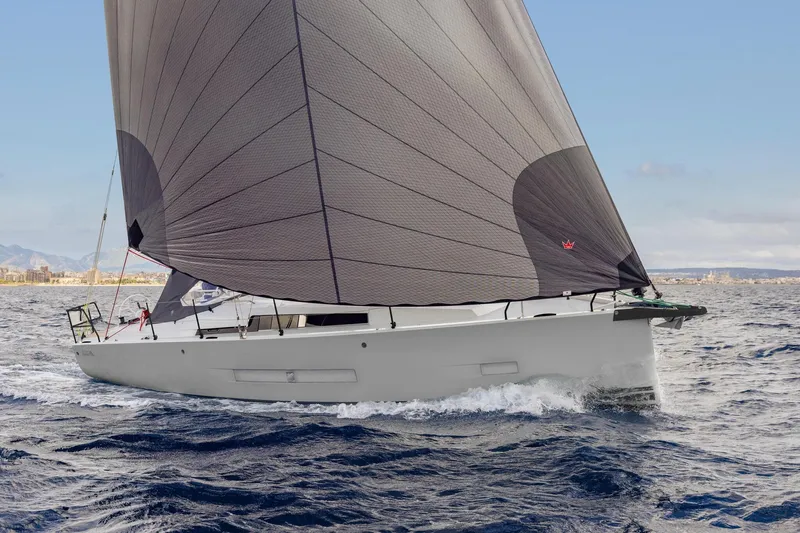Slide: The Image of 2026 Hanse 360 ST sailboat navigating open waters with sleek design and large sail. - 5