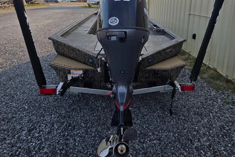 Slide: The Image of Propeller of 2026 Xpress X18DB boat on gravel surface. - 13