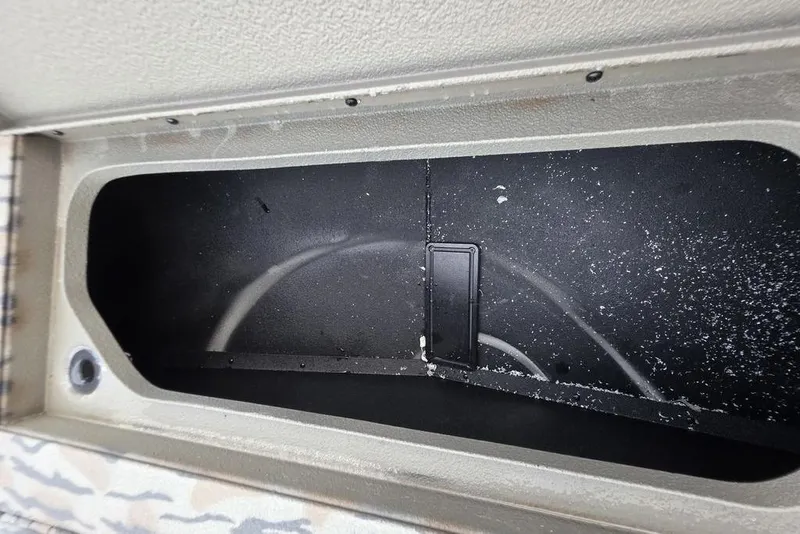 Slide: The Image of 2026 Xpress X18DB boat interior with camouflage design and logo detail. - 30