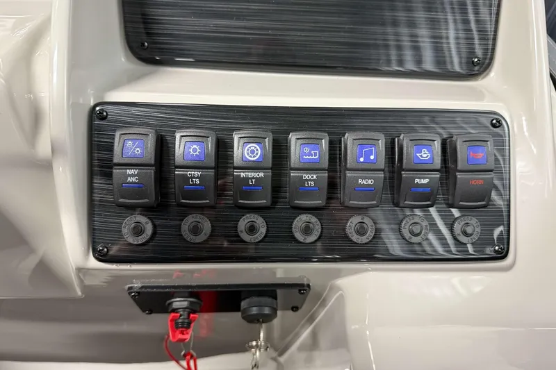 Slide: The Image of Control panel of 2026 Sylvan Mirage 820 Cruise with labeled switches and buttons. - 10