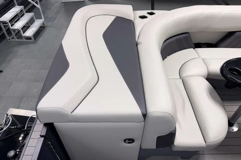 Slide: The Image of Luxurious seating on 2026 Sylvan Mirage 820 Cruise pontoon boat, featuring sleek design and cup holders. - 14