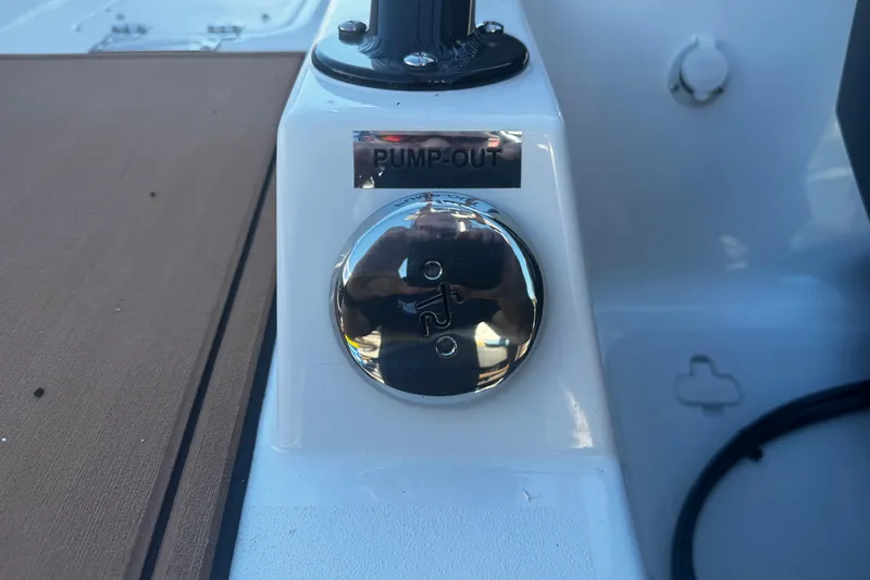 Slide: The Image of Pump-out valve on 2026 Sea Pro 245FLX Sandbar boat deck. - 14