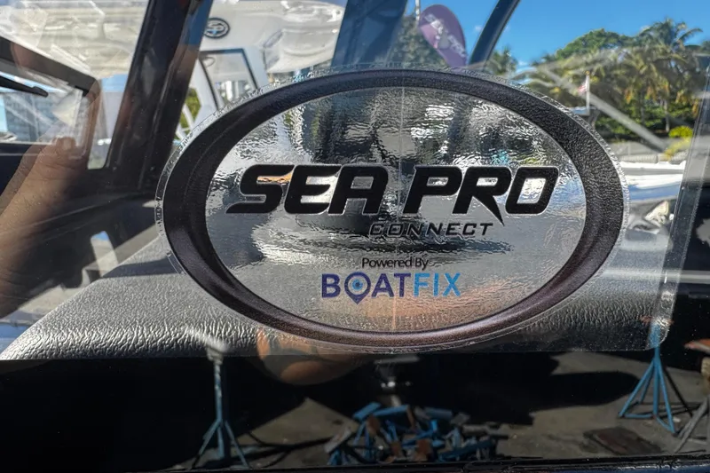 Slide: The Image of Sea Pro Connect logo on 2026 Sea Pro 245FLX Sandbar boat, powered by BoatFix. - 38