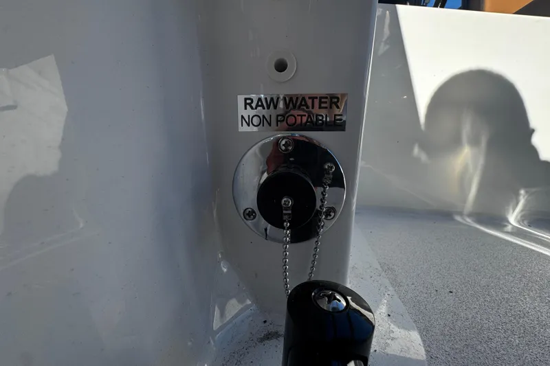 Slide: The Image of Raw water non-potable label on 2026 Sea Pro 245FLX Sandbar boat. - 41