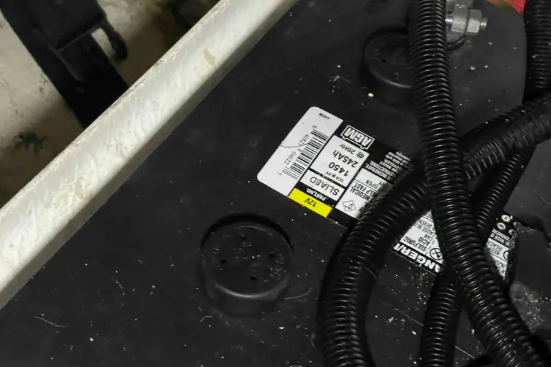 Slide: The Image of Battery with cables on a 2002 President Trawler boat. - 101