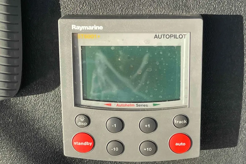 Slide: The Image of Raymarine autopilot control panel on 2002 President Trawler boat. - 74