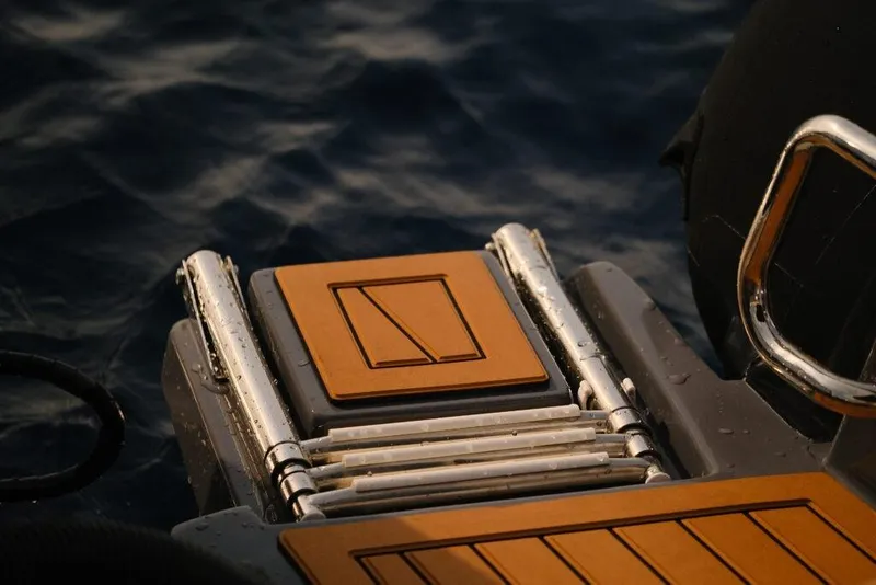 Slide: The Image of Northstar Orion 7 boat deck detail, 2026 model, with water droplets and ocean background. - 4