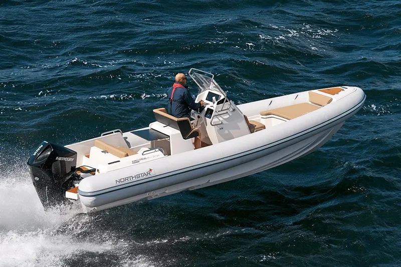 Slide: The Image of 2026 Northstar Orion 7 boat navigating ocean waves at high speed. - 8