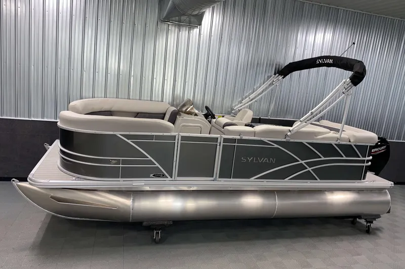 The Image of 2026 Sylvan Mirage 820 Cruise pontoon boat in a showroom setting. - 0