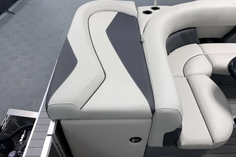 Slide: The Image of 2026 Sylvan Mirage 820 Cruise boat interior with stylish seating and cup holders. - 10