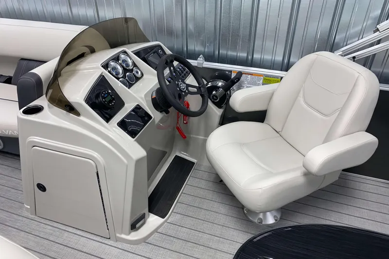 Slide: The Image of Captain's chair and helm of 2026 Sylvan Mirage 820 Cruise boat. - 7