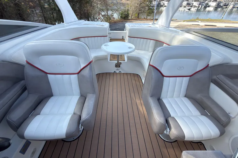 Slide: The Image of Interior of 2004 Cobalt 262 boat with stylish seating and wooden flooring. - 16