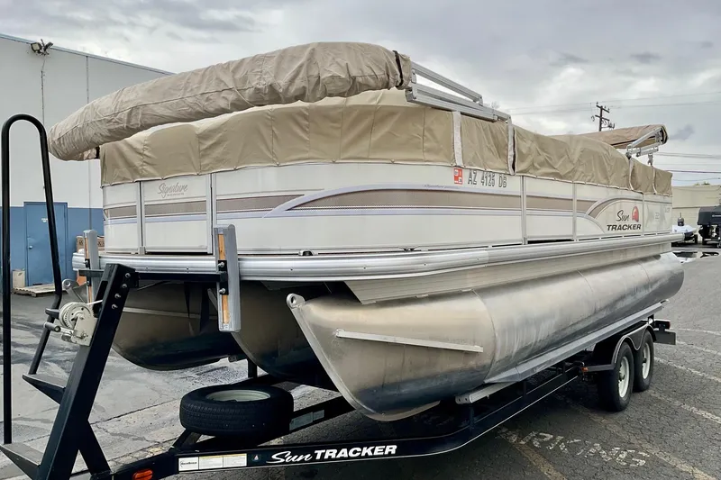 Slide: The Image of 2015 Sun Tracker Party Barge 22 XP3 pontoon boat on trailer. - 6