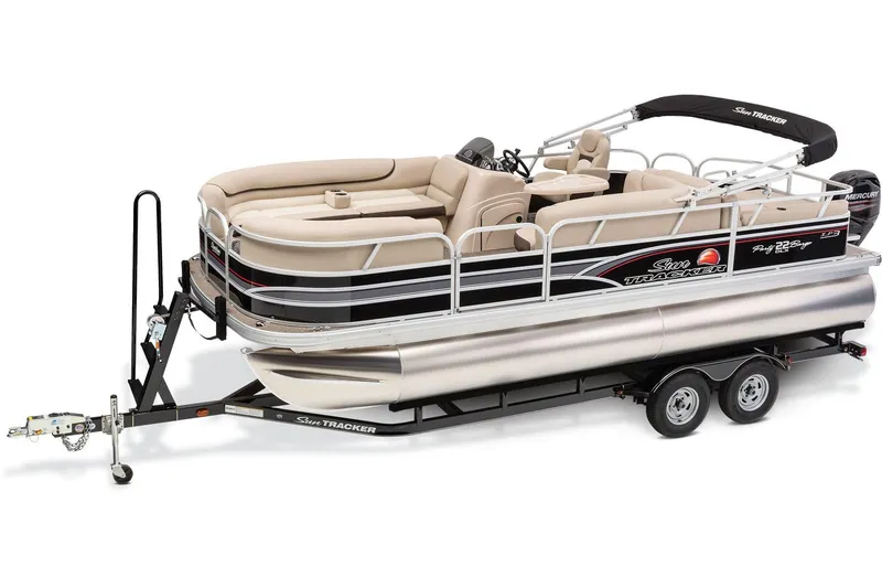 Slide: The Image of 2015 Sun Tracker Party Barge 22 XP3 interior with beige seating and steering console. - 8