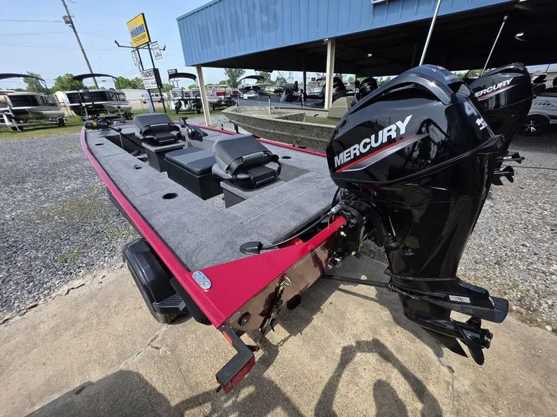 Slide: The Image of 2025 Tracker Panfish™ 17 boat with Mercury engine, parked outdoors. - 18