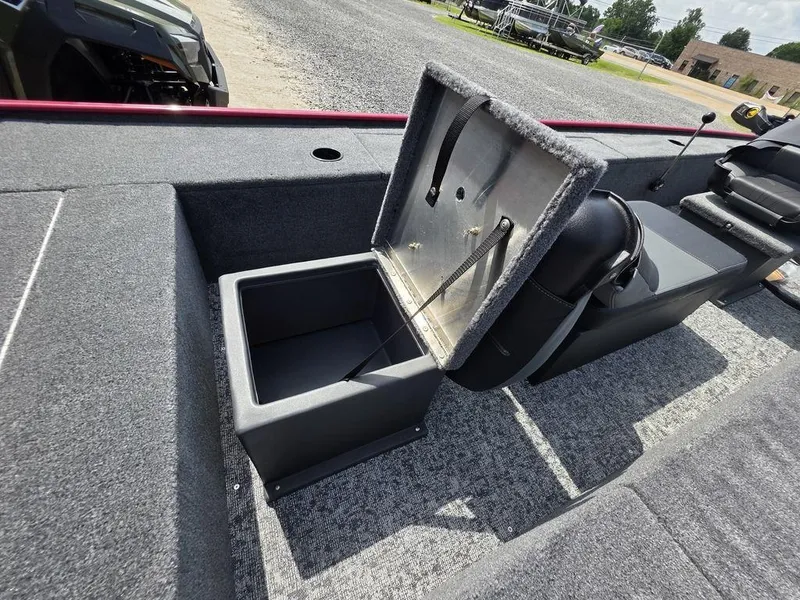 Slide: The Image of 2025 Tracker Panfish™ 17 boat interior with open storage compartment. - 5