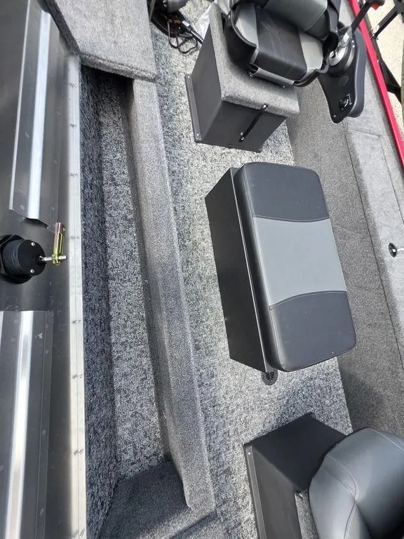 Slide: The Image of 2025 Tracker Panfish™ 17 boat interior with gray seating and carpeted flooring. - 8