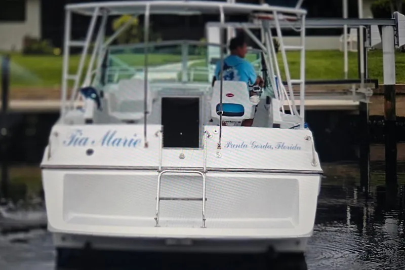 Slide: The Image of 1987 Chris Craft Amerosport boat named Tia Maria in Punta Gorda, Florida. - 1