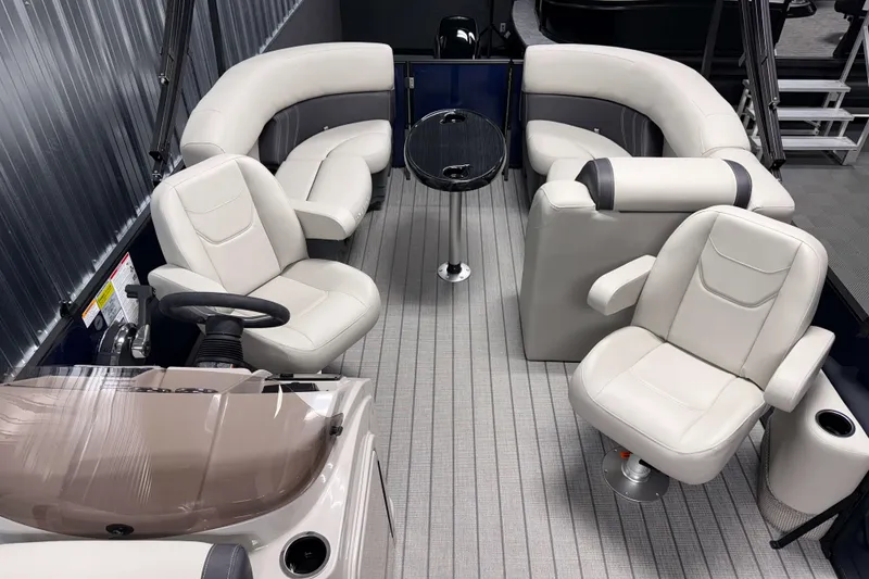 Slide: The Image of 2026 Sylvan Mirage 820 LZ pontoon boat interior with plush seating and modern design. - 5