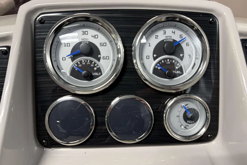 Slide: The Image of Dashboard of 2026 Sylvan Mirage 820 LZ with speedometer and fuel gauges. - 9