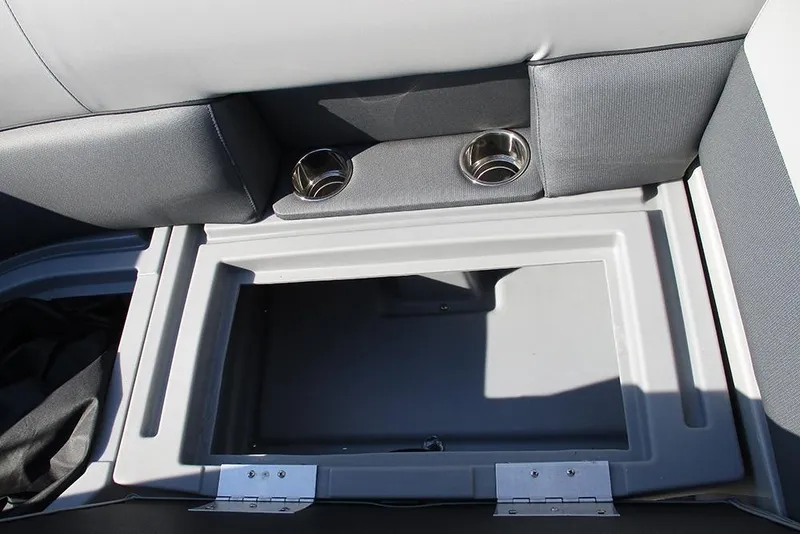 Slide: The Image of Interior storage compartment of 2026 Bentley Pontoons Legacy 220 Swingback with cup holders. - 18