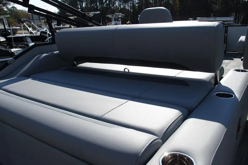 Slide: The Image of 2026 Bentley Pontoons Legacy 220 Swingback with luxurious seating and cup holders. - 21