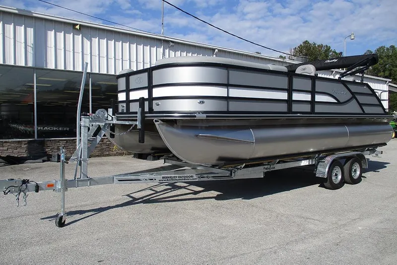 Slide: The Image of 2026 Bentley Pontoons Legacy 220 Swingback on trailer outside dealership. - 3