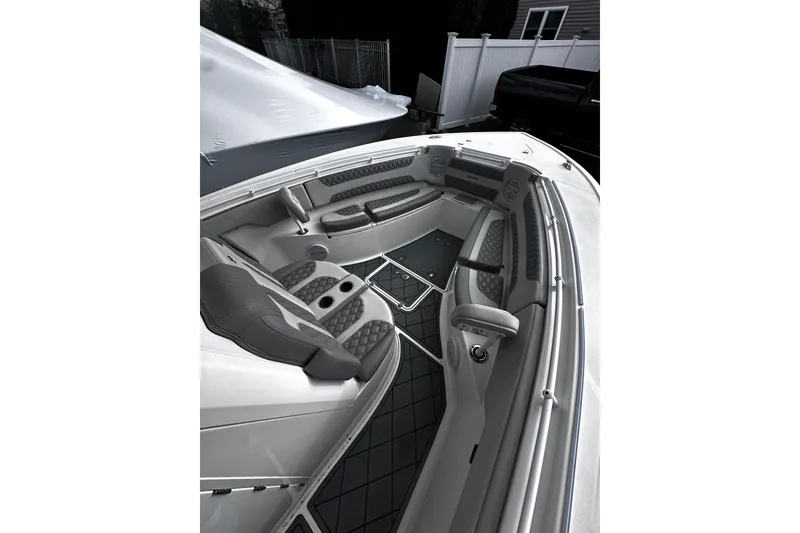 Slide: The Image of 2023 Sea Pro 320 DLX Offshore boat interior with luxurious seating and modern design. - 11