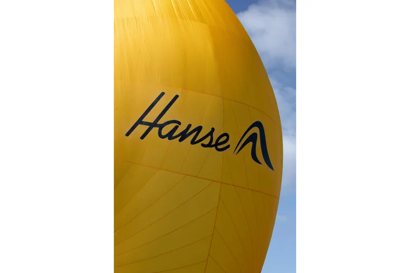 Slide: The Image of Yellow sail with Hanse logo, 2026 Hanse 360 ST yacht. - 10