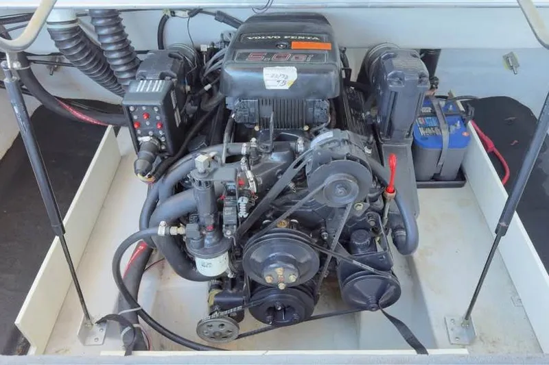 Slide: The Image of 1998 Cobalt 220 boat engine compartment with Volvo Penta 5.0 GL motor. - 10