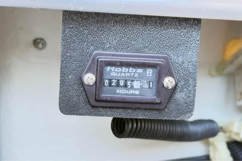 Slide: The Image of Hour meter reading 205.4 hours on 1998 Cobalt 220 boat. - 7