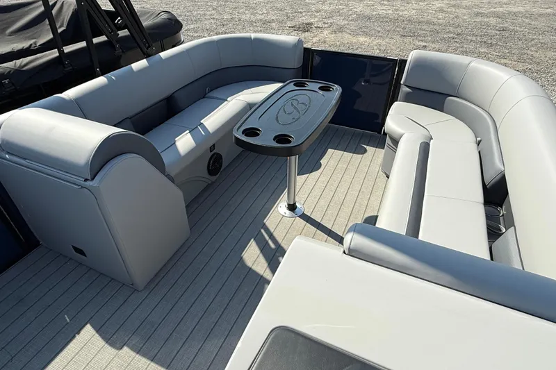 Slide: The Image of 2026 Bentley Pontoons Legacy 243 Swingback interior with modern helm and seating. - 5