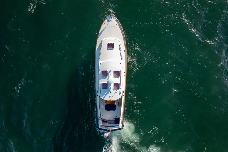 Slide: The Image of Aerial view of 2007 Hinckley Picnic Boat 36 EP cruising on open water. - 6