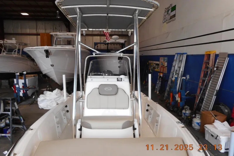Slide: The Image of 2022 Key West 1720 Center Console boat in a workshop setting. - 10
