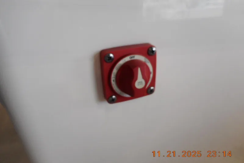 Slide: The Image of Red switch on 2022 Key West 1720 Center Console boat panel. - 16