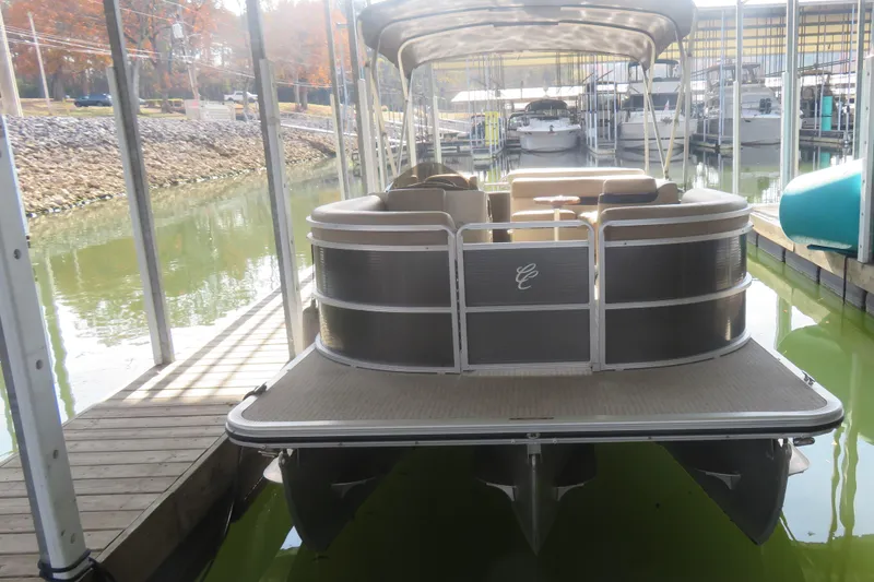 Slide: The Image of 2013 Cypress Cay Seabreeze 230 pontoon boat docked in a marina. - 3