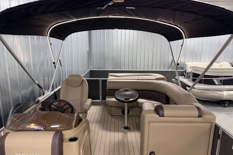 Slide: The Image of 2026 Sylvan Mirage 8520 Cruise pontoon boat with canopy and luxurious seating. - 14