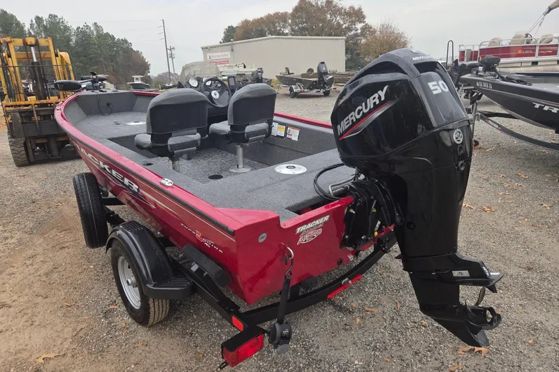 Slide: The Image of 2025 Tracker Super Guide V-16 SC boat with Mercury 50 engine on trailer. - 5