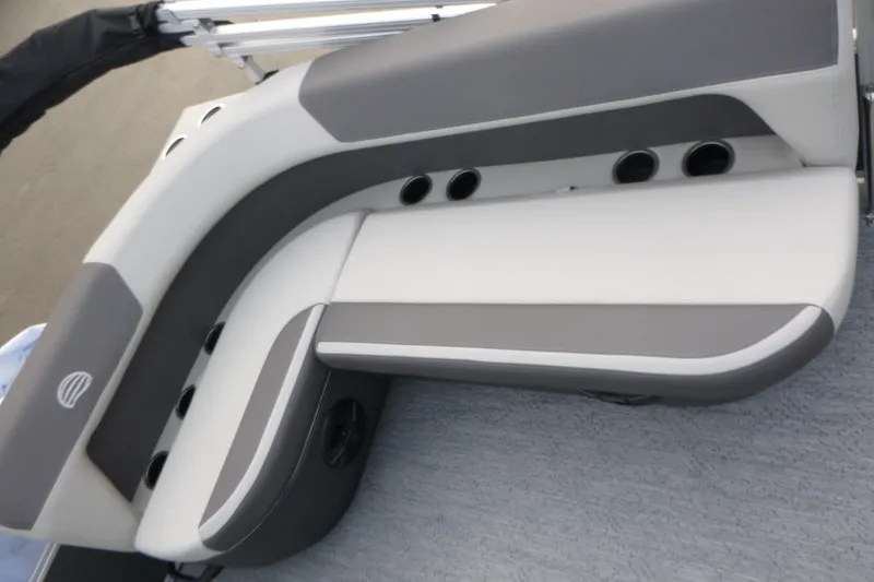 Slide: The Image of 2026 Sun Tracker Bass Buggy 16 XL Select boat seating, featuring gray and white upholstery. - 7