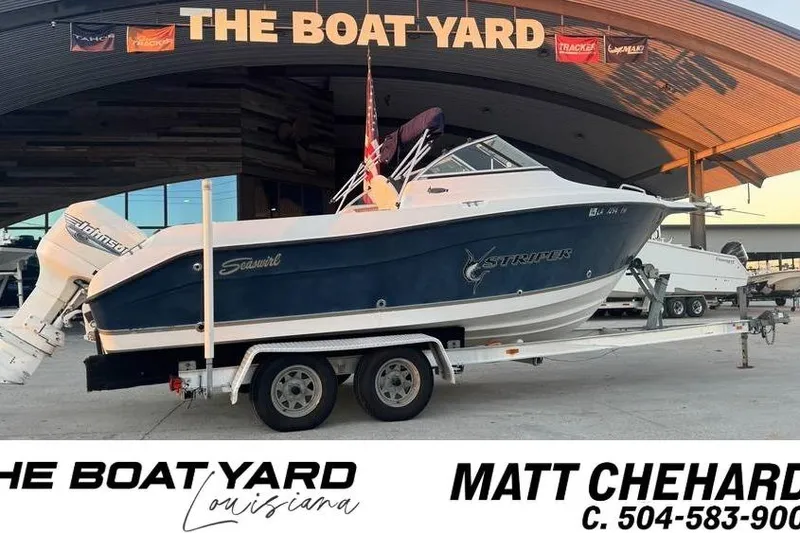 The Image of 2006 Seaswirl Striper 2101 Dual Console OB on trailer at The Boat Yard, Louisiana. - 1