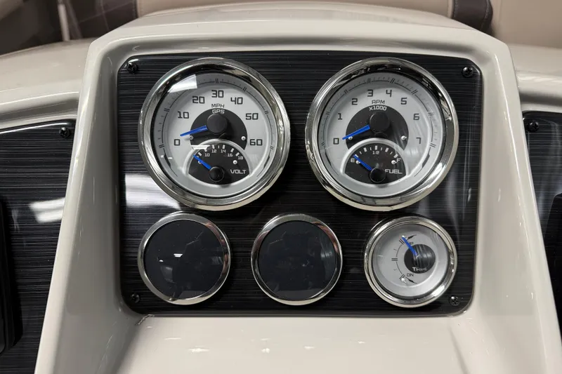 Slide: The Image of Dashboard of 2026 Sylvan Mirage 8520 LZ with speedometer and fuel gauges. - 11