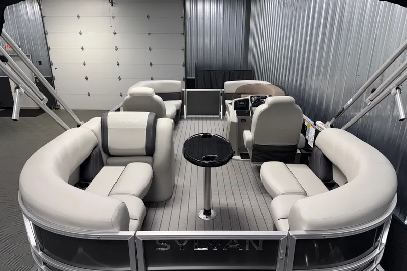 Slide: The Image of 2026 Sylvan Mirage 8520 LZ pontoon boat interior with luxurious seating and modern design. - 16