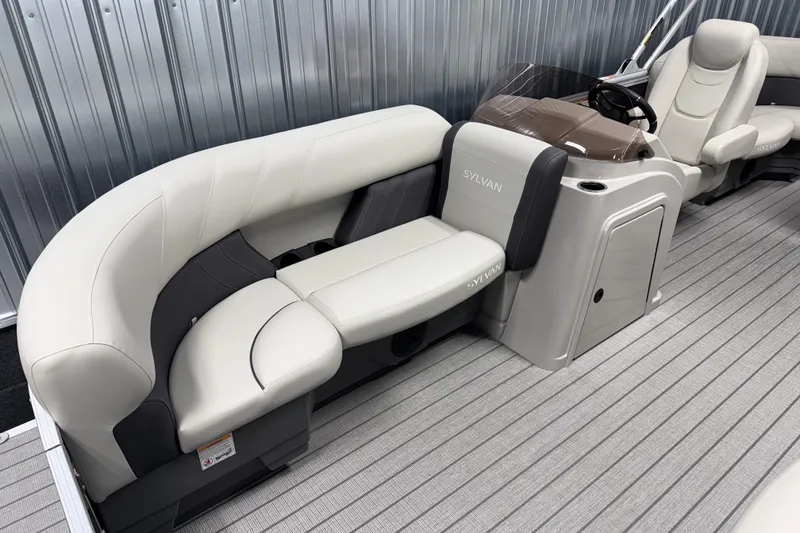Slide: The Image of 2026 Sylvan Mirage 8520 LZ pontoon boat interior with luxurious seating and modern design. - 2