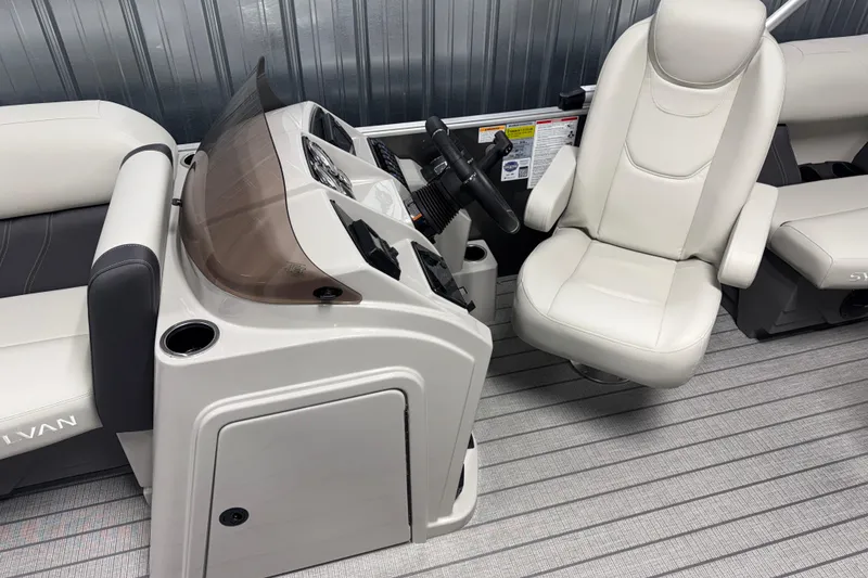 Slide: The Image of Interior of 2026 Sylvan Mirage 8520 LZ boat with sleek helm and comfortable seating. - 6