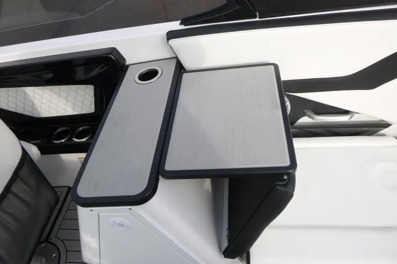 Slide: The Image of 2026 Yamaha Boats 252S interior with sleek seating and foldable table design. - 10