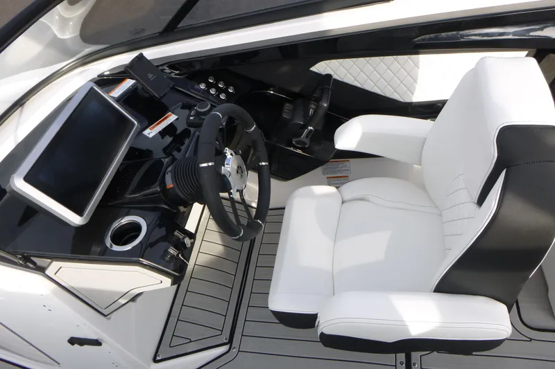 Slide: The Image of 2026 Yamaha Boats 252S cockpit with sleek steering wheel and modern dashboard. - 11