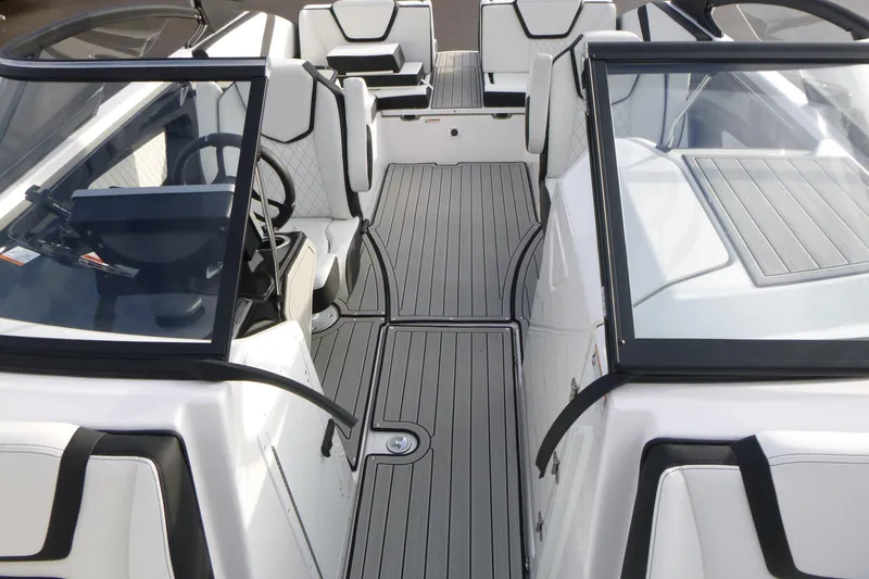 Slide: The Image of 2026 Yamaha Boats 252S interior with sleek design and modern seating arrangement. - 19